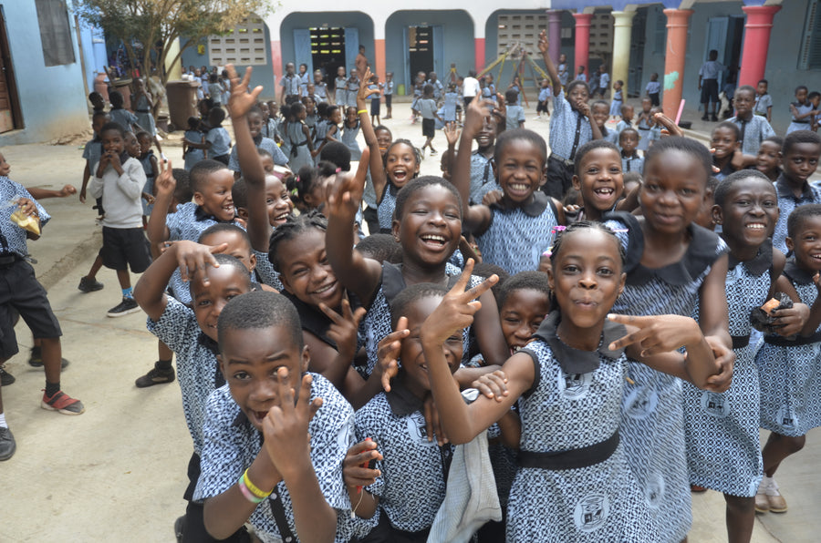 School children in Ghana enjoying enriched meals